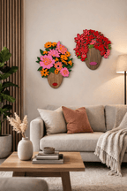 Decorative wall art with floral designs above a sofa in a living room.